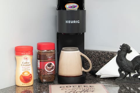 Cozy coffee corner stocked with essentials to start your mornings right.