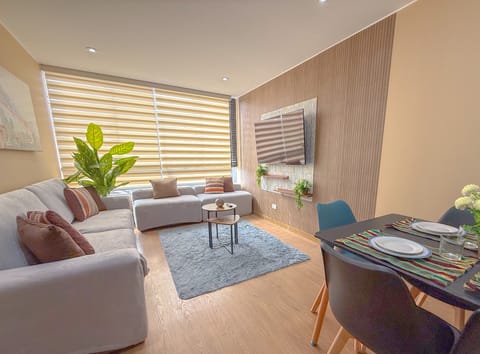 Comfort Apartment, Balcony, City View | Living area | Flat-screen TV