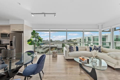 Panoramic views stretch across Santa Monica, a dynamic backdrop.