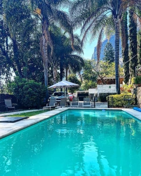 Outdoor pool, open 8:30 AM to 9:00 PM, pool umbrellas