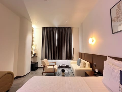 Luxury Room | Iron/ironing board, bed sheets
