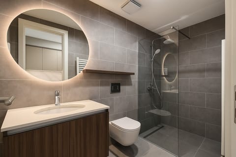 Superior Apartment, Patio | Bathroom | Shower, hair dryer, slippers, towels