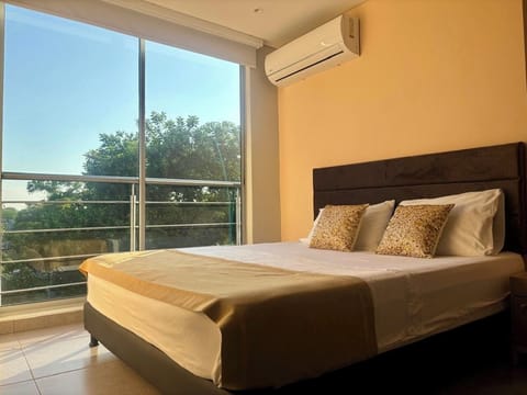 Studio Suite, City View | Iron/ironing board, WiFi (free), bed sheets