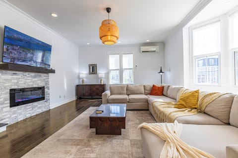 Bright Boston living room with a large, relaxing sectional!
