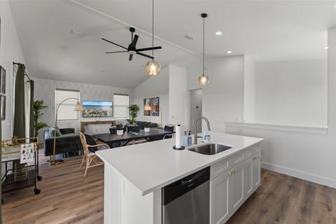 Expansive kitchen with oversized island, updated appliances, and an open flow ideal for cooking and gathering.