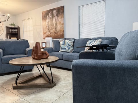 The spacious living room offers a comfortable and inviting space.