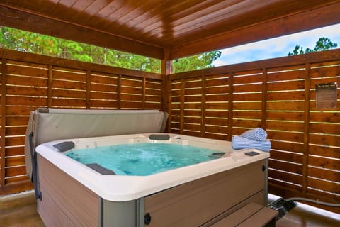 Hot Tub Retreat: Unwind in your private hot tub under the stars, surrounded by nature's beauty!