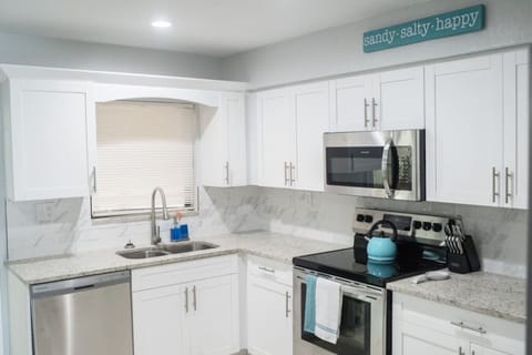 Cook, brew, and savor! ☕ Kitchen delights include a dishwasher, fridge with ice, stove, and microwave. Enjoy Dunkin` Donuts coffee, creamers, sugars, and teas. Your culinary journey begins here! #KitchenMagic #BrewAndChew