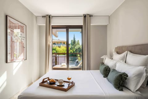 Wake up to light-drenched mornings in this serene bedroom with views – your personal retreat
