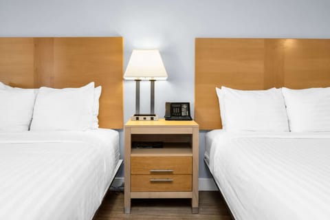 Deluxe Two Beds - Feel free to make use of the room's direct dial phone.