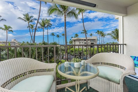 Private lanai with calming tropicals and peek-a-boo ocean views