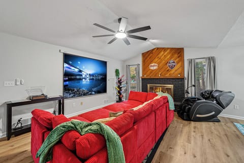 You'll enjoy a 100’’ projector screen and a massage chair that knows no stress