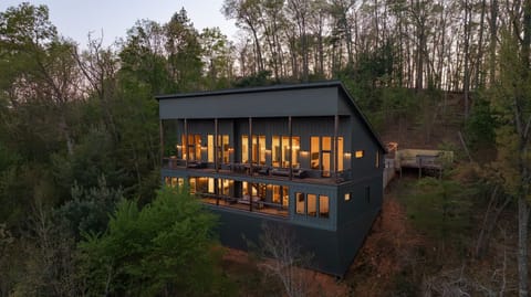 Exterior | Architecturally striking retreat with panoramic long-range mountain views