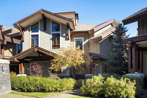 - Beautiful exterior with modern mountain architecture  
- Surrounded by trees for a peaceful private stay  
- Warm wood accents welcome you to your Whistler retreat  