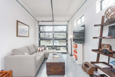 Austin Outpost Living Room with Sofa Sleeper + TV