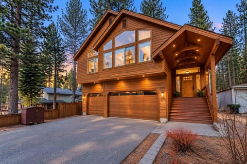 High-end Tahoe retreat surrounded by towering pines, with National Forest land behind the home and hiking trails just 100 feet away. Enjoy a private hot tub, central A/C, and 24/7 local support.