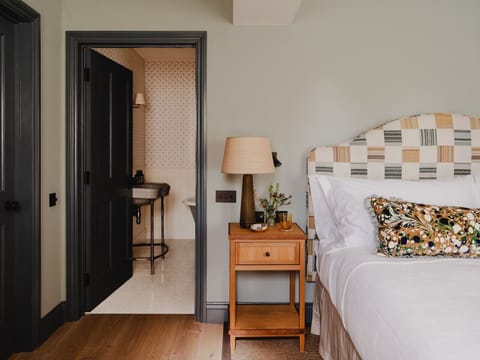 Soft, layered textures and a calm, light-filled bedroom designed for rest