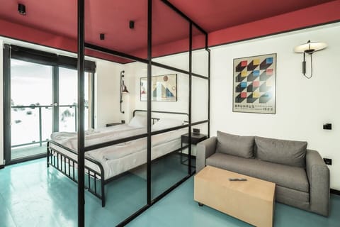The apartment is very stylish and features modern design aspects.