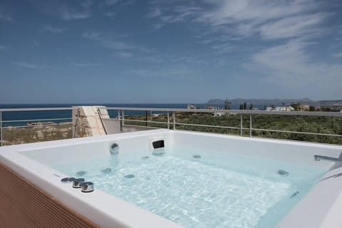 Luxury Outdoor Jacuzzi Surrounded by Ocean Vistas