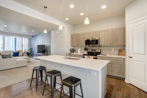 With additional seating at the kitchen island.