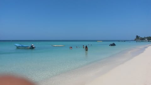 Private beach nearby, white sand, sun loungers, beach umbrellas