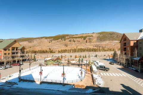 Enjoy picturesque mountain views and easy access to nearby ski slopes from the vibrant ice rink area in River Run Village.