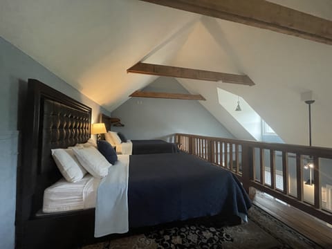 Deluxe Suite, 2 Bedrooms, 2 Bathrooms, Garden Area | Iron/ironing board, rollaway beds, free WiFi, bed sheets