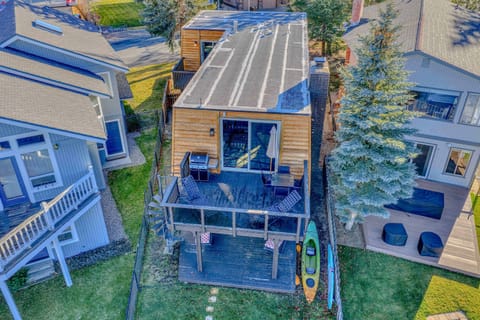 Exterior (back): Upper deck, spiral staircase, lower patio, access to private dock