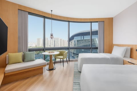 Premium Room, 2 Twin Beds, City View | Down comforters, minibar, in-room safe, individually furnished
