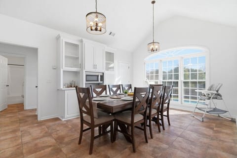 Open-Concept Dining and Kitchen — Seamless design for family meals and easy entertaining.
