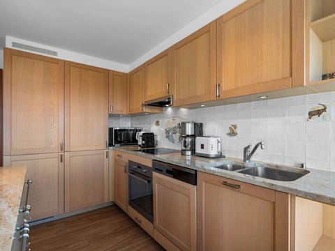 Kitchen, Cabinetry, Countertop, Kitchen Appliance, Interior Design, Furniture, Wood, Flooring, Major Appliance, Floor