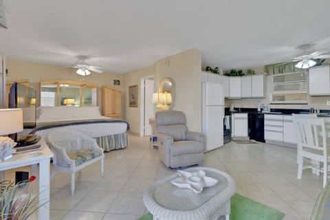 The studio features an open-concept design that seamlessly blends the living, dining, kitchen, and sleeping areas into one spacious layout.