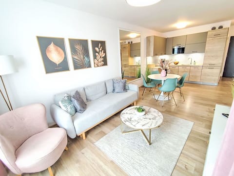 Furniture, Interior Design, Flooring, Floor, Living Room, Room, Couch, Wood Flooring, Ceiling, Chair