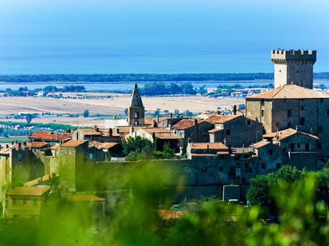 Sky, Blue, Wall, Summer, Town, Human Settlement, Morning, Tower, Spire