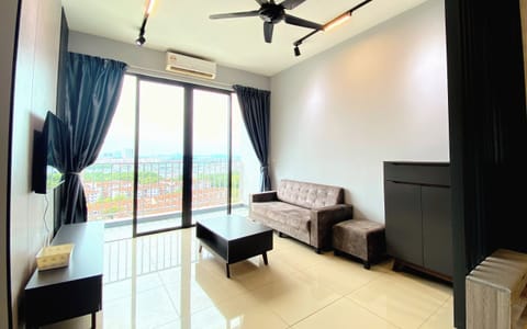 Basic Apartment, 2 Bedrooms | Living area | 50-inch flat-screen TV with digital channels