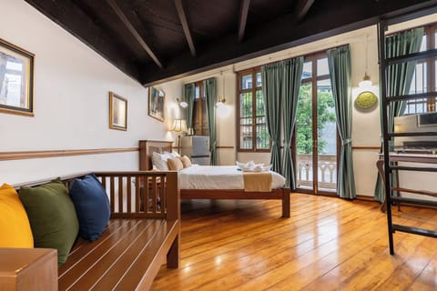 Superior Quadruple Room, 2 Queen Beds, Balcony, City View | Free WiFi