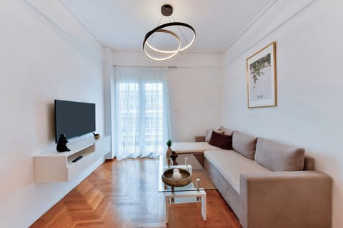 Apartment, 3 Bedrooms | Living area | Flat-screen TV