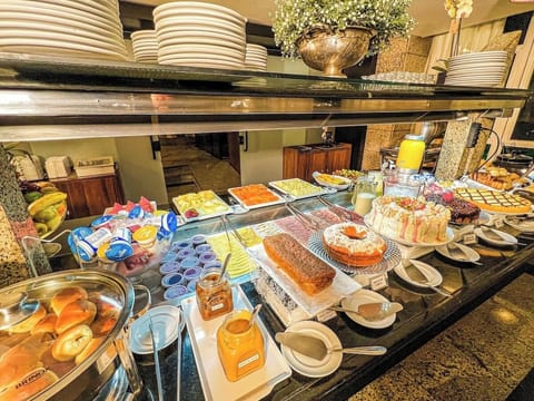 Indulge in sweet treats and fresh options at the buffet.