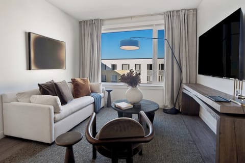 Modern furnishings and warm ambiance define this inviting lounge.
Unwind with a good book or stream your favorite show.