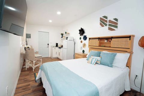 Bed and kitchen