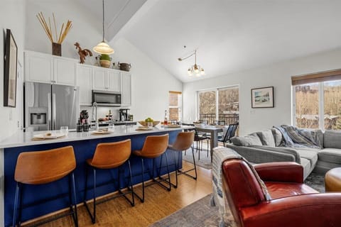 Kitchen: Drip coffee maker, blender, toaster, cooking utensils, tableware