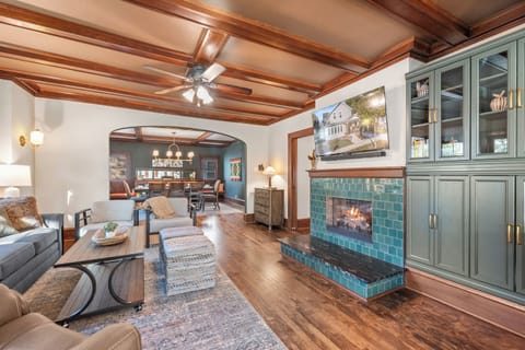 Cozy living area centered around a beautiful lake-inspired tile fireplace.