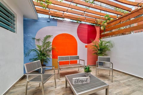 Enjoy an morning coffee or evening cocktail in the private veranda in the back of the house.