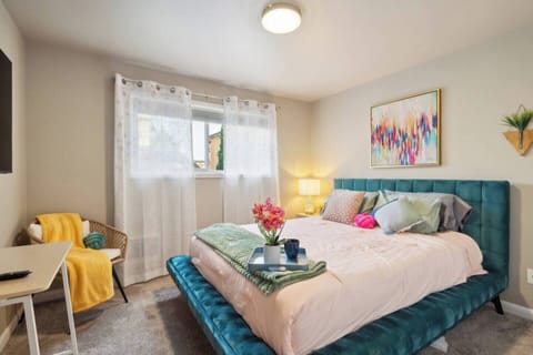 Whimsical bedroom with a quaint work from home space.