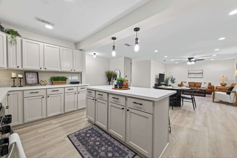 Kitchen: Sleek design with modern fixtures—perfect for whipping up culinary delights.