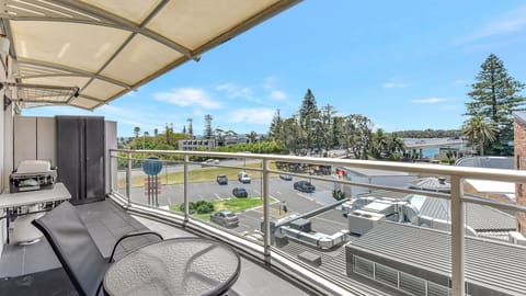 Private balcony with seating and views over the park and water