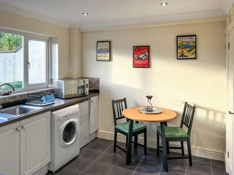 Kitchen/diner | At Cedar Lodge Apartment, Glen Mona, Isle of Man