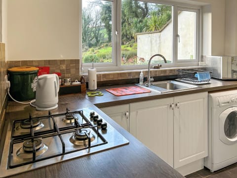 Kitchen/diner | At Cedar Lodge Apartment, Glen Mona, Isle of Man