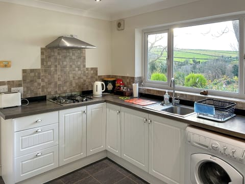 Kitchen/diner | At Cedar Lodge Apartment, Glen Mona, Isle of Man