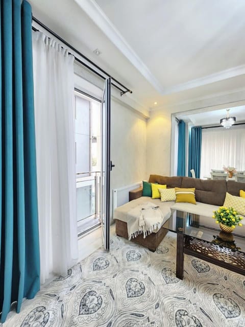 Comfort Apartment, Balcony, Courtyard View | Living area | 43-inch LED TV with digital channels